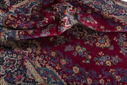 Surface texture of 1970s Yazd rug with natural Wool and intricate pattern
