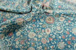 Surface texture of 1930s Yazd rug with natural Wool and intricate pattern