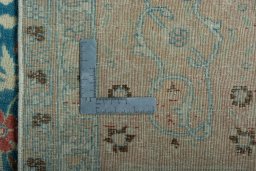 Backside of handmade 1930s Yazd rug showing knot structure and weave density