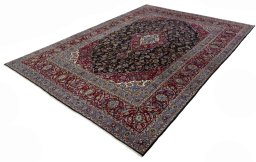 Corner detail of 2000s Yazd rug showing border pattern and Wool pile