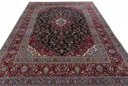 Surface texture of 2000s Yazd rug with natural Wool and intricate pattern