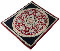 Corner detail of 2000s Yazd rug showing border pattern and Wool pile