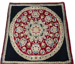 Surface texture of 2000s Yazd rug with natural Wool and intricate pattern