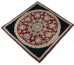 Corner detail of 2000s Yazd rug showing border pattern and Wool pile