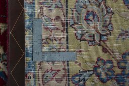 Backside of handmade 2000s Yazd rug showing knot structure and weave density