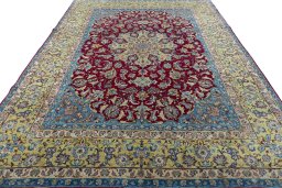 Surface texture of 2000s Yazd rug with natural Wool and intricate pattern