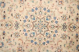 Corner detail of 2000s Yazd rug showing border pattern and Wool pile