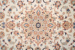 Corner detail of 2000s Yazd rug showing border pattern and Wool pile