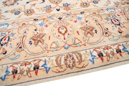 Backside of handmade 2000s Yazd rug showing knot structure and weave density