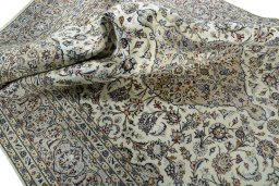 Surface texture of 2000s Kashan rug with natural Wool and intricate pattern