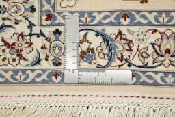 Corner detail of New Nain 6La with Silk rug showing border pattern and Wool pile