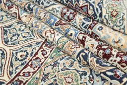 Corner detail of New Nain 6La with Silk rug showing border pattern and Wool pile
