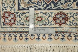 Close-up detail of New Nain 6La with Silk rug from Iran / Persia showing Wool weave
