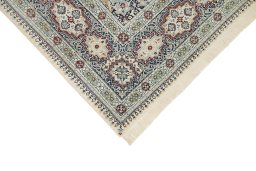 Backside of handmade New Nain 6La with Silk rug showing knot structure and weave density
