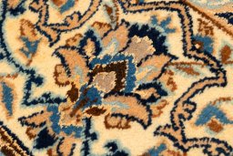 Central medallion detail of New Nain 6La with Silk rug from Iran / Persia