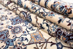 Surface texture of 2020s Nain 6La with Silk rug with natural Wool and intricate pattern