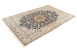 Corner detail of 2019s Nain 6La with Silk rug showing border pattern and Wool pile