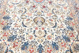 Corner detail of 2020s Nain 6La with Silk rug showing border pattern and Wool pile
