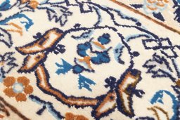 Surface texture of 2020s Nain 6La with Silk rug with natural Wool and intricate pattern