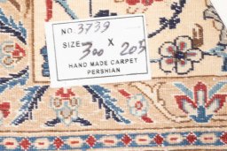 Central medallion detail of 2020s Nain 6La with Silk rug from Iran / Persia