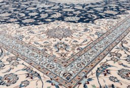 Corner detail of New Nain 6La with Silk rug showing border pattern and Wool pile