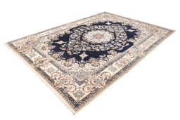 Corner detail of 2021s Nain 6La with Silk rug showing border pattern and Wool pile