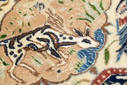 Central medallion detail of New Nain 6La with Silk rug from Iran / Persia