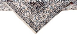 Corner detail of New Nain 6La with Silk rug showing border pattern and Wool pile