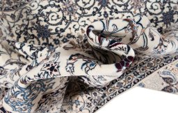 Corner detail of New Nain 6La with Silk rug showing border pattern and Wool pile