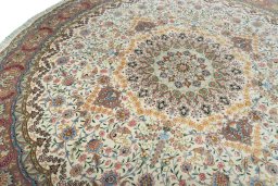 Backside of handmade New Tabriz 50/60/70 Raj rug showing knot structure and weave density