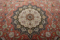 Backside of handmade New Tabriz 50/60/70 Raj rug showing knot structure and weave density