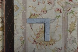 Backside of handmade New Tabriz 50/60/70 Raj rug showing knot structure and weave density