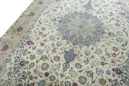 Backside of handmade New Tabriz 50/60/70 Raj rug showing knot structure and weave density