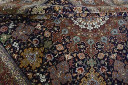 Surface texture of 1970s Tabriz 50/60/70 Raj rug with natural Cork and intricate pattern
