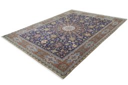 Corner detail of 1970s Tabriz 50/60/70 Raj rug showing border pattern and Cork pile