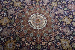 Central medallion detail of 1970s Tabriz 50/60/70 Raj rug from Iran / Persia