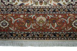 Corner detail of New Tabriz 50/60/70 Raj rug showing border pattern and Cork pile