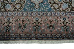 Corner detail of 1970s Tabriz 50/60/70 Raj rug showing border pattern and Cork pile