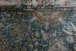 Surface texture of 1970s Tabriz 50/60/70 Raj rug with natural Cork and intricate pattern