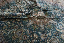 Backside of handmade 1970s Tabriz 50/60/70 Raj rug showing knot structure and weave density