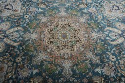 Central medallion detail of 1970s Tabriz 50/60/70 Raj rug from Iran / Persia