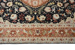 Corner detail of New Tabriz 50/60/70 Raj rug showing border pattern and Cork pile