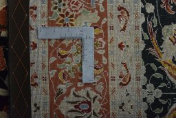 Backside of handmade New Tabriz 50/60/70 Raj rug showing knot structure and weave density