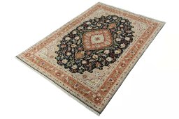 Corner detail of New Tabriz 50/60/70 Raj rug showing border pattern and Cork pile