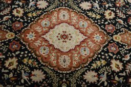 Central medallion detail of New Tabriz 50/60/70 Raj rug from Iran / Persia