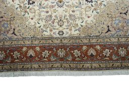 Corner detail of New Tabriz 50/60/70 Raj rug showing border pattern and Cork pile