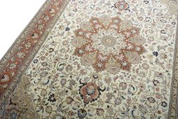 Backside of handmade New Tabriz 50/60/70 Raj rug showing knot structure and weave density