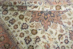 Surface texture of New Tabriz 50/60/70 Raj rug with natural Cork and intricate pattern