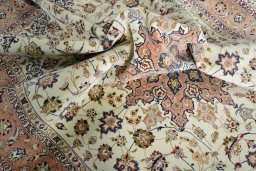 Backside of handmade New Tabriz 50/60/70 Raj rug showing knot structure and weave density