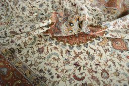 Backside of handmade New Tabriz 50/60/70 Raj rug showing knot structure and weave density